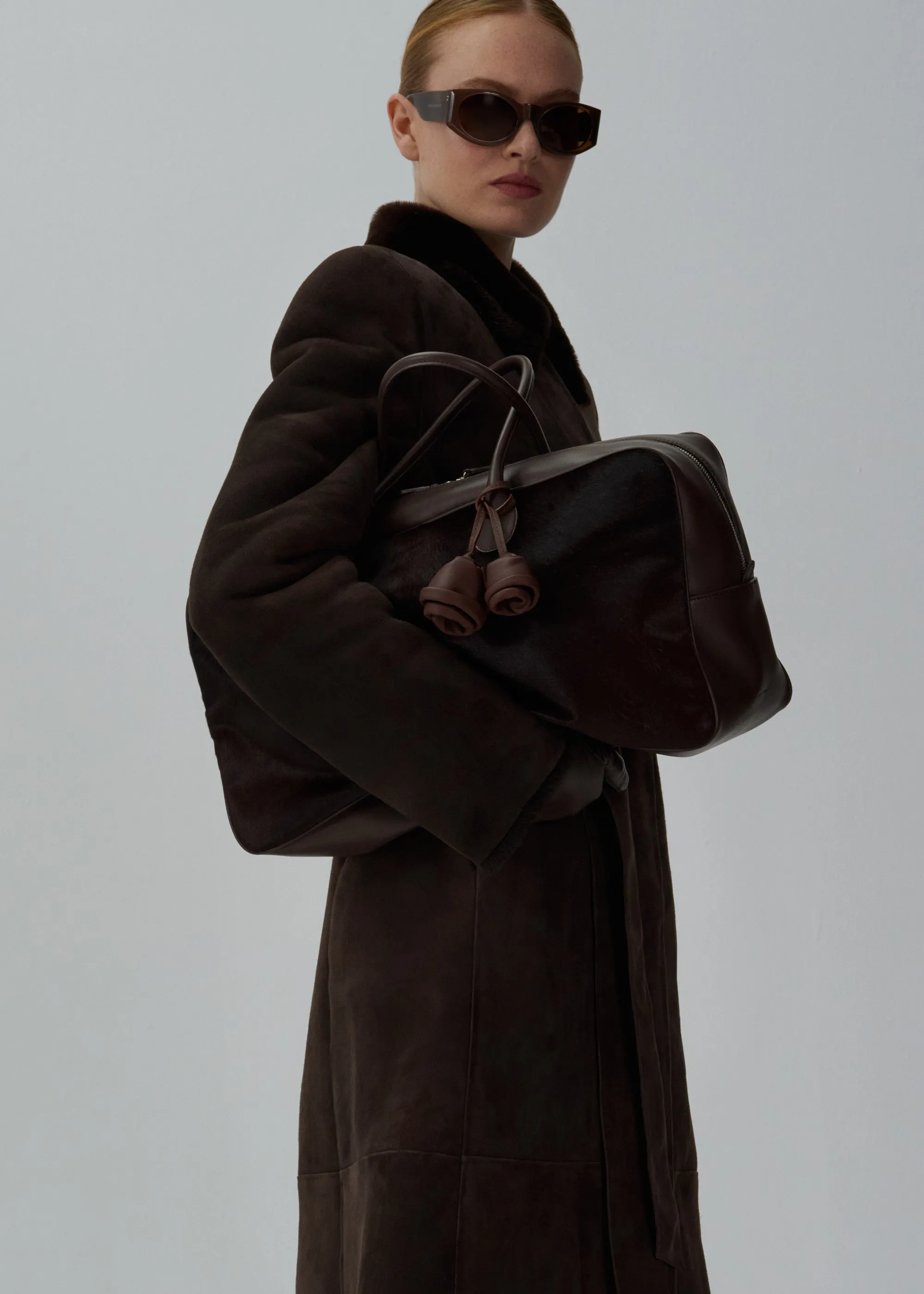 Belted shearling coat in brown