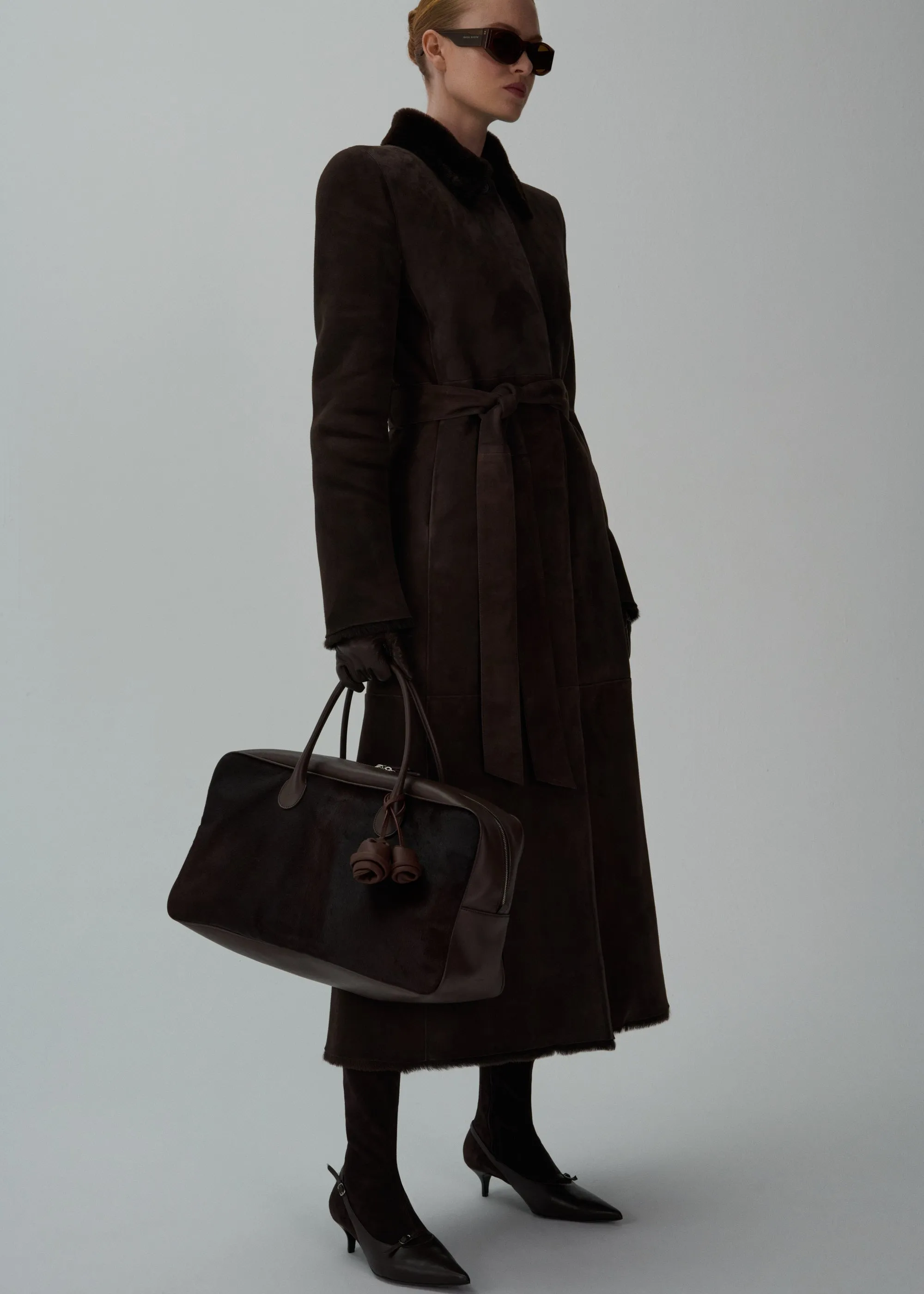 Belted shearling coat in brown